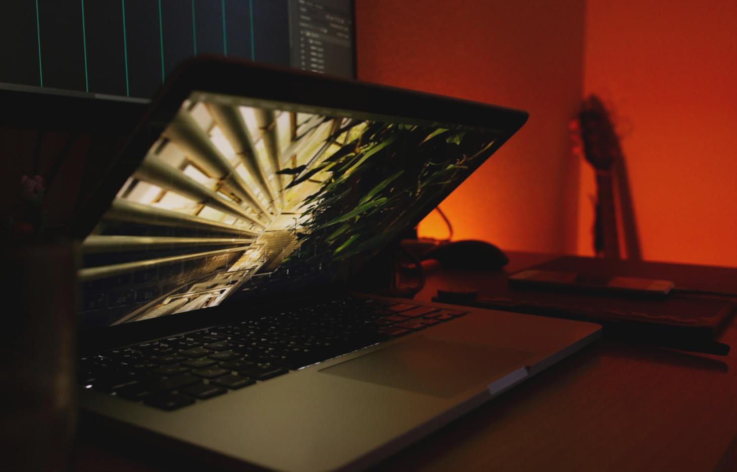 Modern office workspace with Vietnamese development team collaborating on API integration project